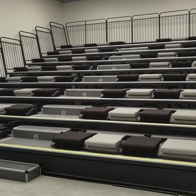 PP Material Retractable Bleacher Seating with Sofa Cushion and Rear Folding Design for Studio Meeting Room